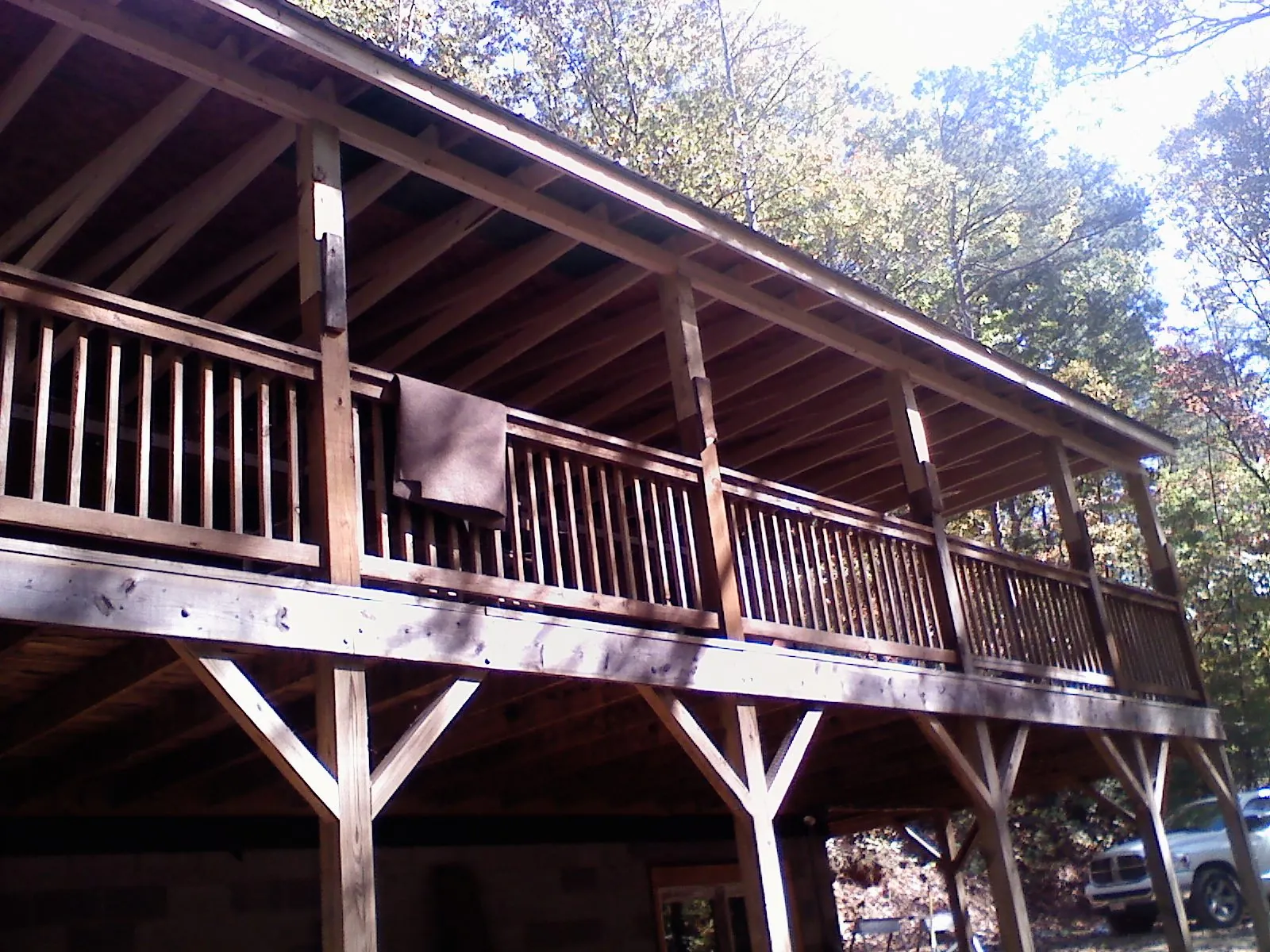 Timber framing under a new elevated porch and deck — Roof Leak Repair in Martell by Roofing Brothers